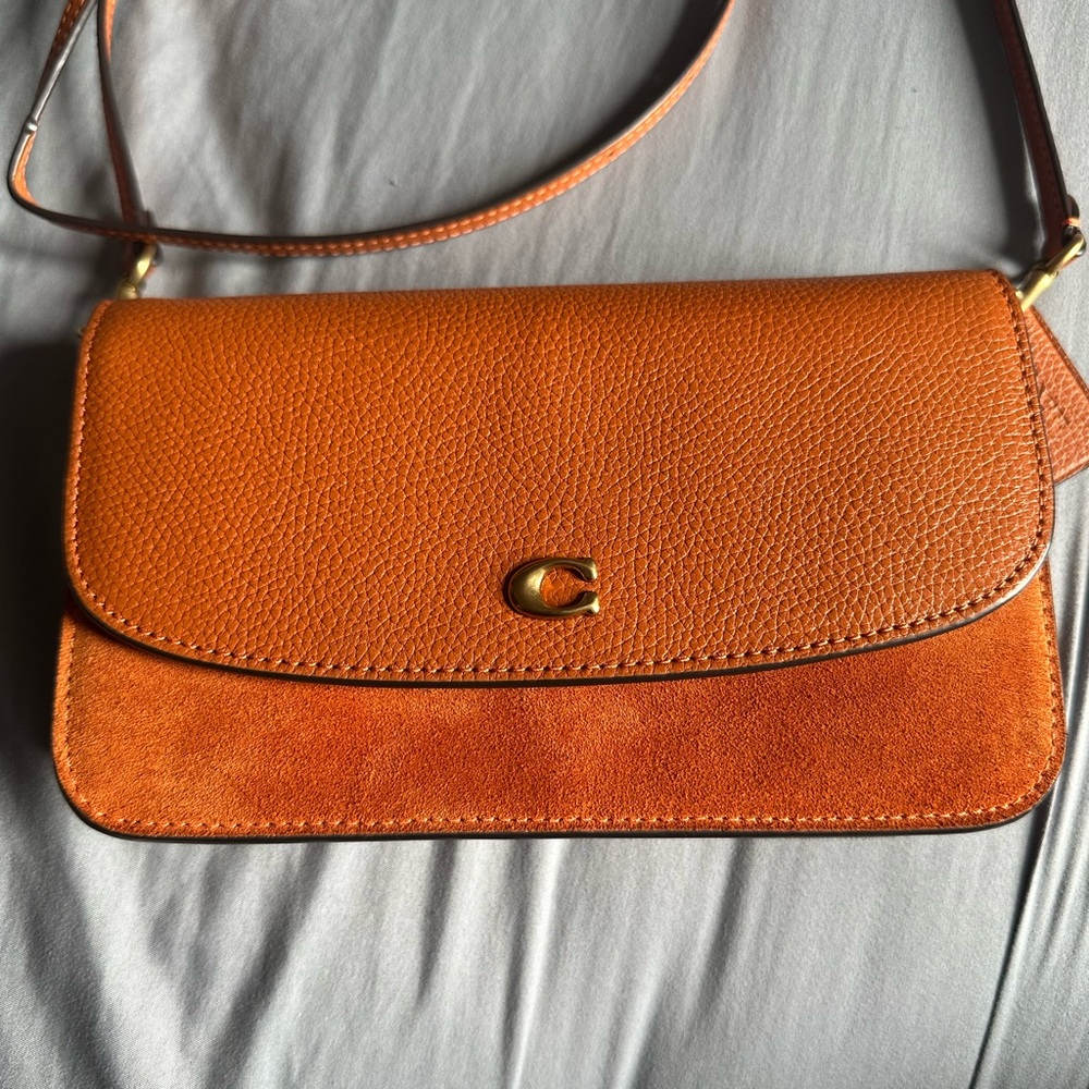 Coach Tan Leather Crossbody Bag with Flap Closure